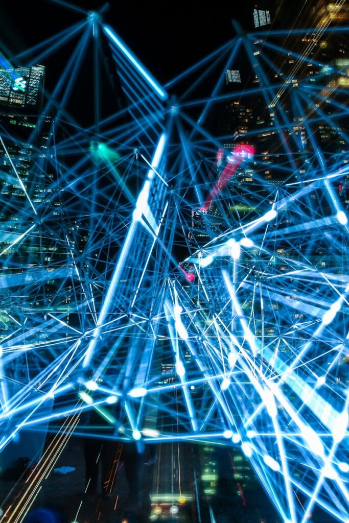 Dynamic urban scene showcasing interconnected light trails representing digital communication networks.